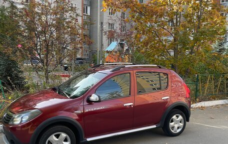 Renault Sandero I, 2013 год, 750 000 рублей, 2 фотография