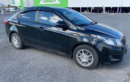 KIA Rio III рестайлинг, 2013 год, 690 000 рублей, 2 фотография