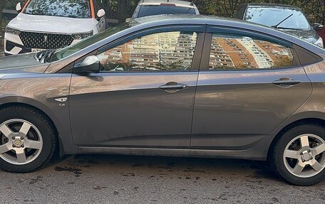 Hyundai Solaris II рестайлинг, 2011 год, 630 000 рублей, 3 фотография