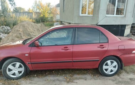 Mitsubishi Lancer IX, 2004 год, 250 000 рублей, 2 фотография