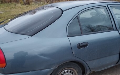 Mitsubishi Carisma I, 1997 год, 130 000 рублей, 15 фотография