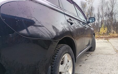 Mitsubishi Outlander III рестайлинг 3, 2012 год, 1 299 000 рублей, 10 фотография