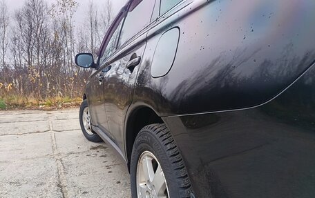 Mitsubishi Outlander III рестайлинг 3, 2012 год, 1 299 000 рублей, 11 фотография