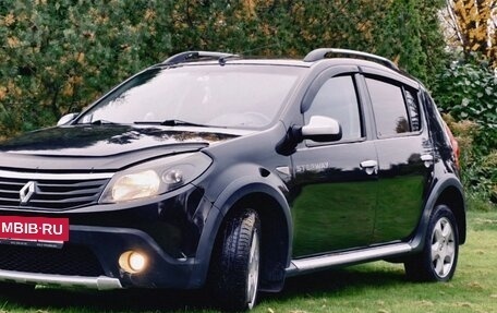 Renault Sandero I, 2013 год, 730 000 рублей, 3 фотография