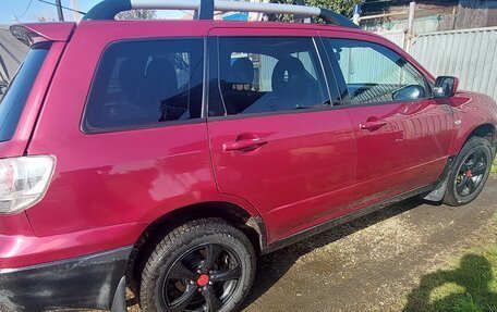 Mitsubishi Outlander III рестайлинг 3, 2004 год, 560 000 рублей, 5 фотография