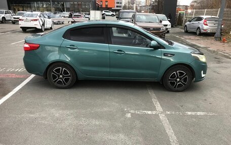KIA Rio III рестайлинг, 2012 год, 750 000 рублей, 2 фотография
