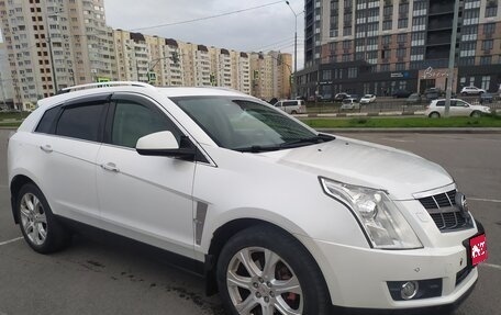 Cadillac SRX II рестайлинг, 2011 год, 900 000 рублей, 1 фотография