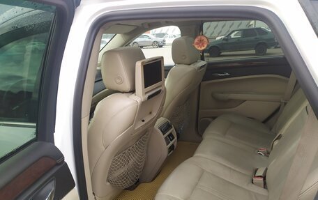 Cadillac SRX II рестайлинг, 2011 год, 900 000 рублей, 11 фотография