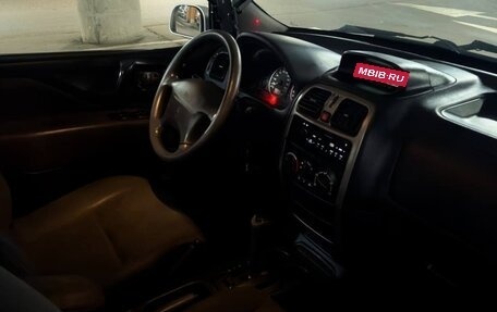 Mitsubishi Space Star I рестайлинг, 2004 год, 430 000 рублей, 21 фотография