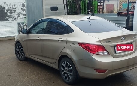 Hyundai Solaris II рестайлинг, 2011 год, 600 000 рублей, 14 фотография