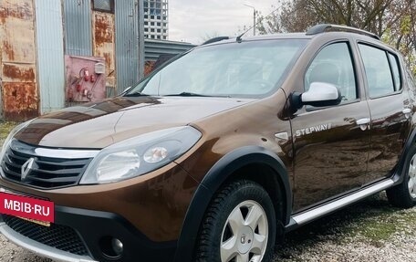 Renault Sandero I, 2013 год, 699 000 рублей, 2 фотография