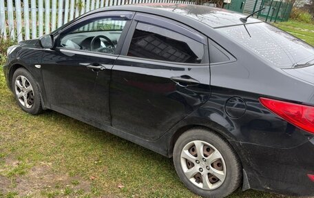 Hyundai Solaris II рестайлинг, 2012 год, 590 000 рублей, 3 фотография