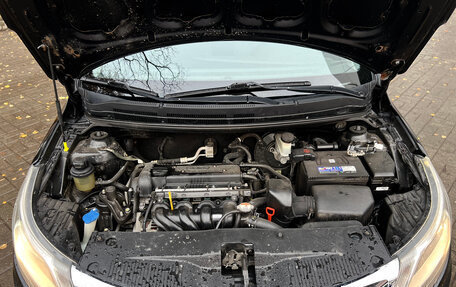 KIA Rio III рестайлинг, 2013 год, 749 000 рублей, 21 фотография