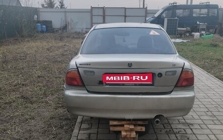 Mazda 323, 1996 год, 125 000 рублей, 11 фотография