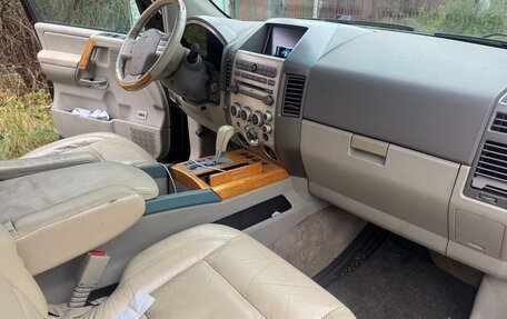 Infiniti QX56, 2004 год, 900 000 рублей, 18 фотография