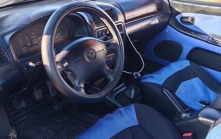 Mazda 323, 1998 год, 189 000 рублей, 10 фотография