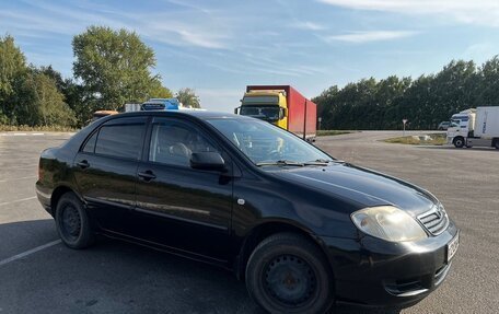 Toyota Corolla, 2004 год, 450 000 рублей, 4 фотография