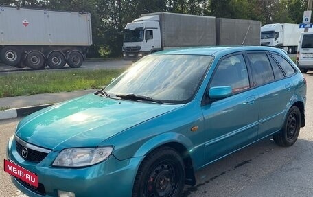 Mazda 323, 2000 год, 250 000 рублей, 15 фотография