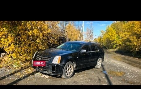 Cadillac SRX II рестайлинг, 2008 год, 555 000 рублей, 3 фотография