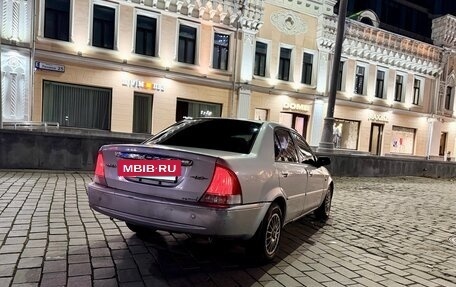 Ford Laser IV, 2001 год, 210 000 рублей, 3 фотография