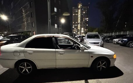 Mitsubishi Mirage VI рестайлинг, 1998 год, 210 000 рублей, 6 фотография