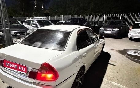 Mitsubishi Mirage VI рестайлинг, 1998 год, 210 000 рублей, 8 фотография