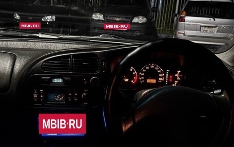 Mitsubishi Mirage VI рестайлинг, 1998 год, 210 000 рублей, 11 фотография