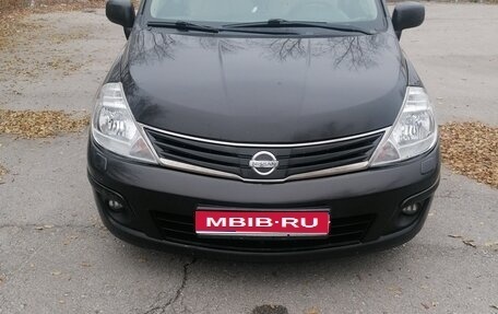 Nissan Tiida, 2010 год, 650 000 рублей, 1 фотография
