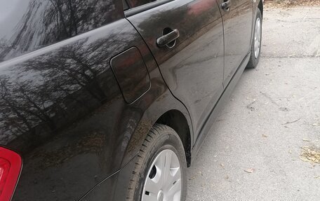 Nissan Tiida, 2010 год, 650 000 рублей, 12 фотография