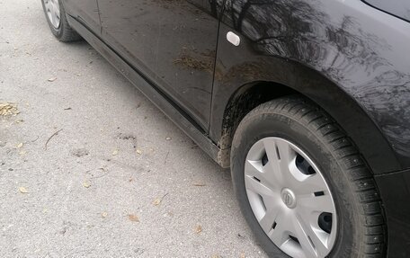 Nissan Tiida, 2010 год, 650 000 рублей, 11 фотография