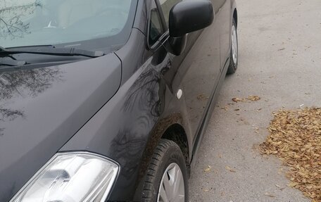 Nissan Tiida, 2010 год, 650 000 рублей, 9 фотография