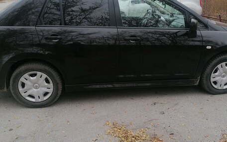 Nissan Tiida, 2010 год, 650 000 рублей, 8 фотография