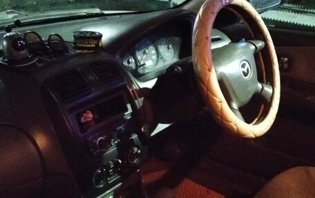 Mazda Familia, 2000 год, 280 000 рублей, 9 фотография