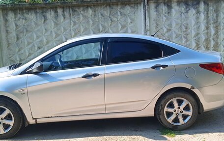 Hyundai Solaris II рестайлинг, 2011 год, 650 000 рублей, 10 фотография