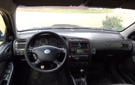 Toyota Avensis III рестайлинг, 2001 год, 200 000 рублей, 18 фотография