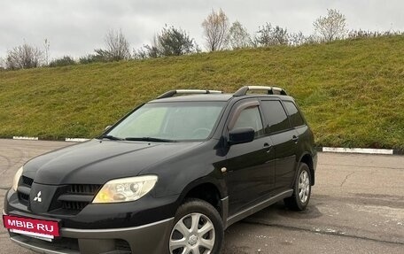 Mitsubishi Outlander III рестайлинг 3, 2007 год, 619 000 рублей, 3 фотография