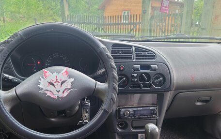 Mitsubishi Lancer VII, 1998 год, 130 000 рублей, 7 фотография