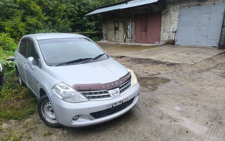 Nissan Tiida, 2009 год, 800 000 рублей, 8 фотография
