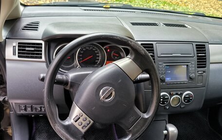 Nissan Tiida, 2010 год, 698 000 рублей, 24 фотография