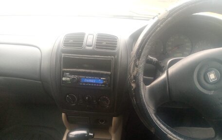 Mazda Familia, 1999 год, 300 000 рублей, 9 фотография