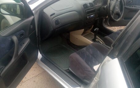 Mazda Familia, 1999 год, 300 000 рублей, 10 фотография