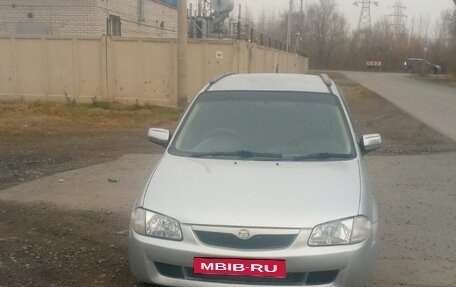 Mazda Familia, 1999 год, 300 000 рублей, 4 фотография