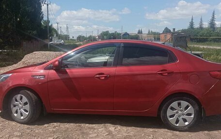 KIA Rio III рестайлинг, 2012 год, 700 000 рублей, 3 фотография