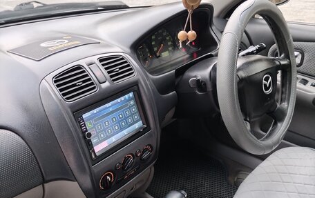 Mazda Familia, 2001 год, 390 000 рублей, 13 фотография