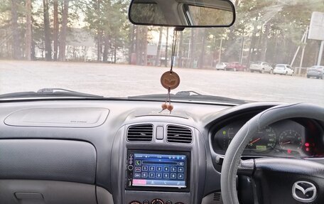 Mazda Familia, 2001 год, 390 000 рублей, 15 фотография