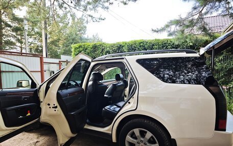 Cadillac SRX II рестайлинг, 2008 год, 880 000 рублей, 31 фотография