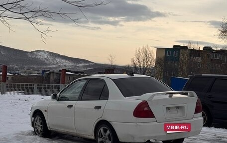 Mitsubishi Mirage VI рестайлинг, 1999 год, 150 000 рублей, 3 фотография