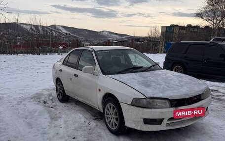 Mitsubishi Mirage VI рестайлинг, 1999 год, 150 000 рублей, 2 фотография