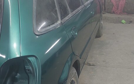 Mazda Familia, 1998 год, 160 000 рублей, 10 фотография