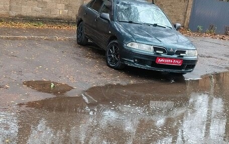 Mitsubishi Carisma I, 1999 год, 260 000 рублей, 1 фотография